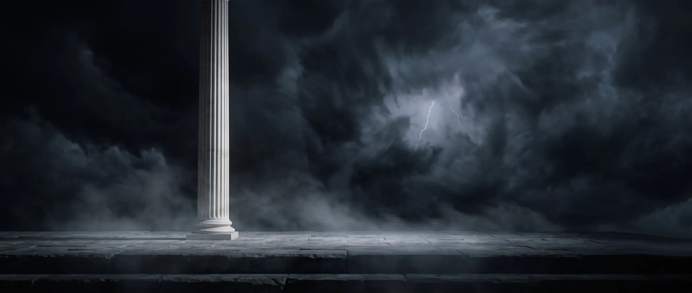 A single marble column steady against a storming sky